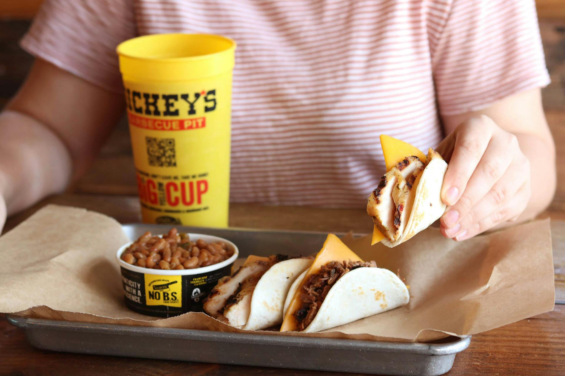 Roland Dickey Stops by New Dickey's Barbecue Pit in Seaside
